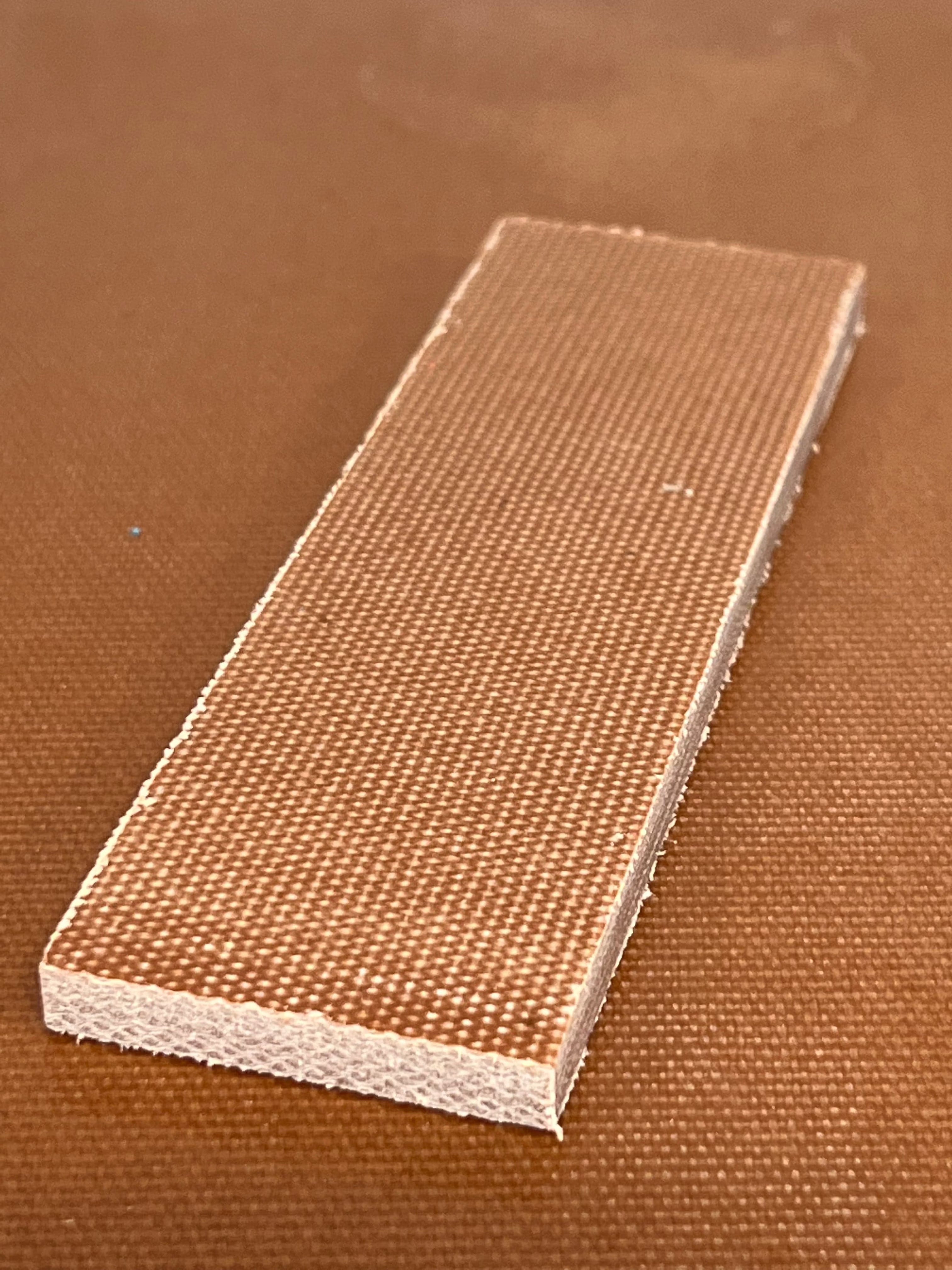 Micarta plate shaft material