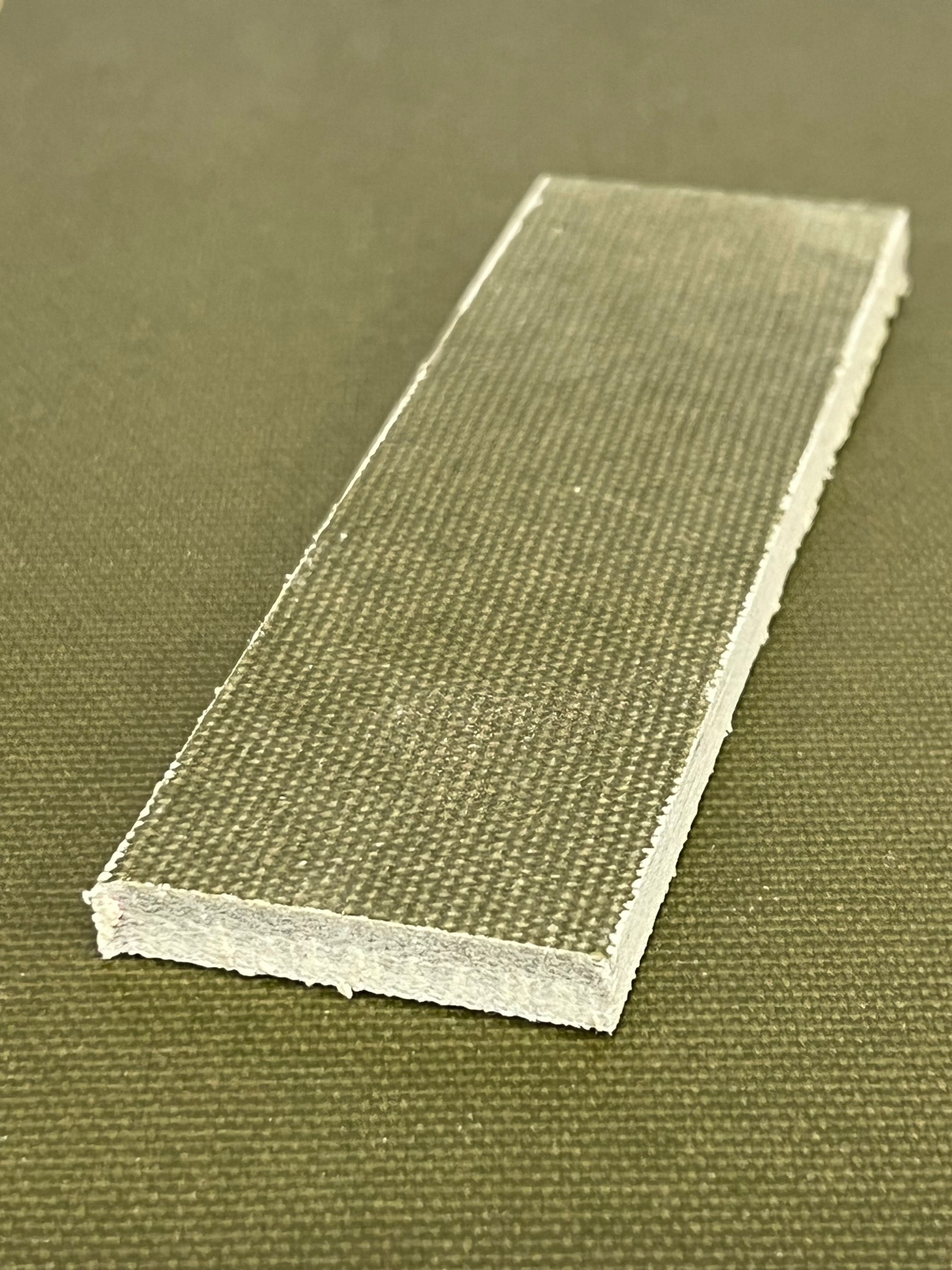 Micarta plate shaft material