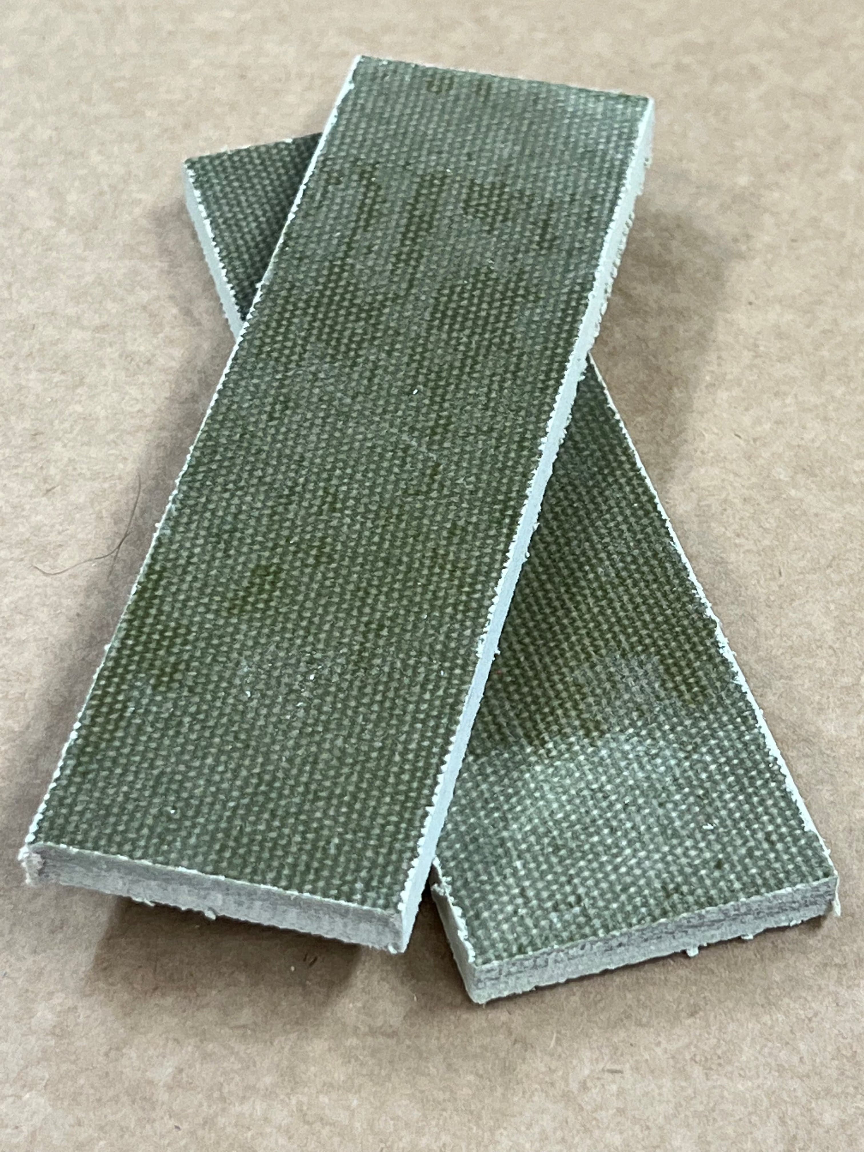 Micarta plate shaft material