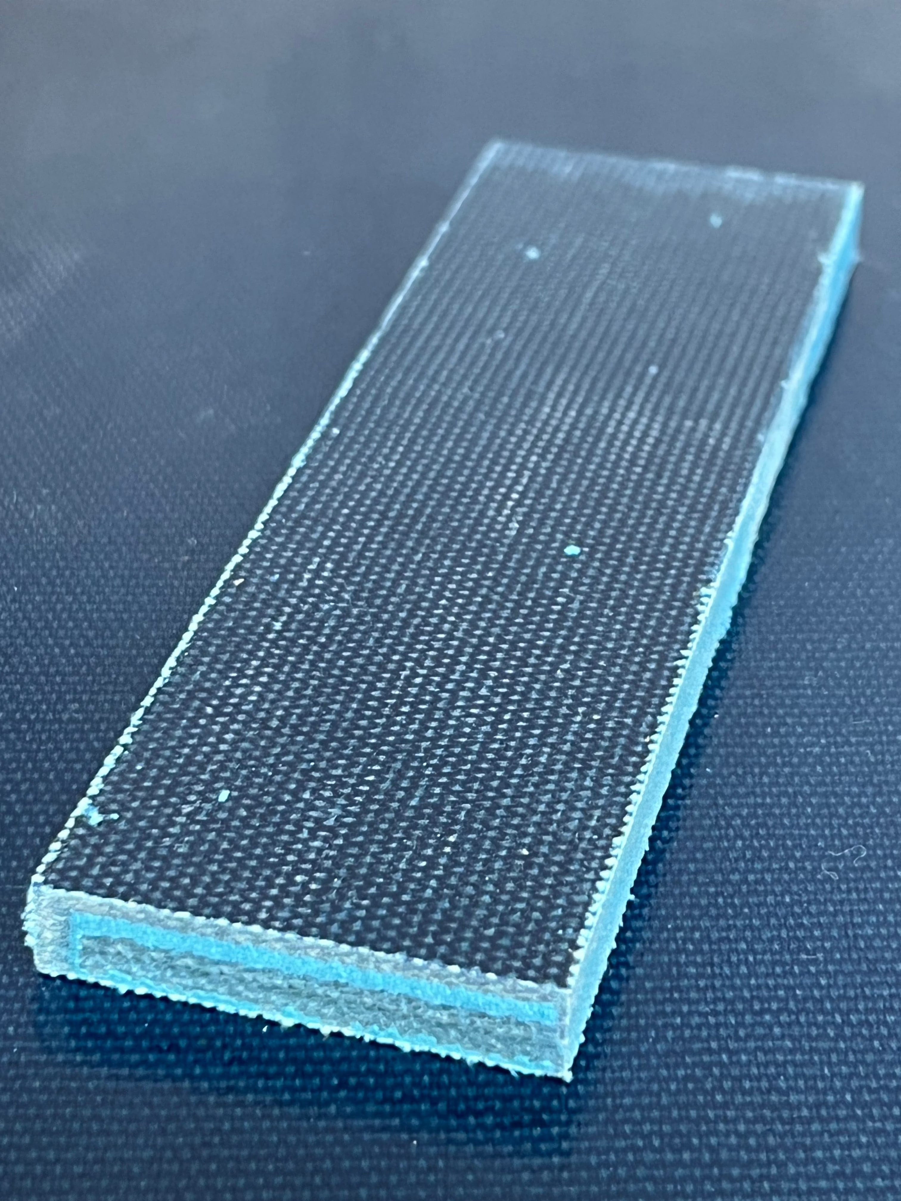 Micarta plate shaft material