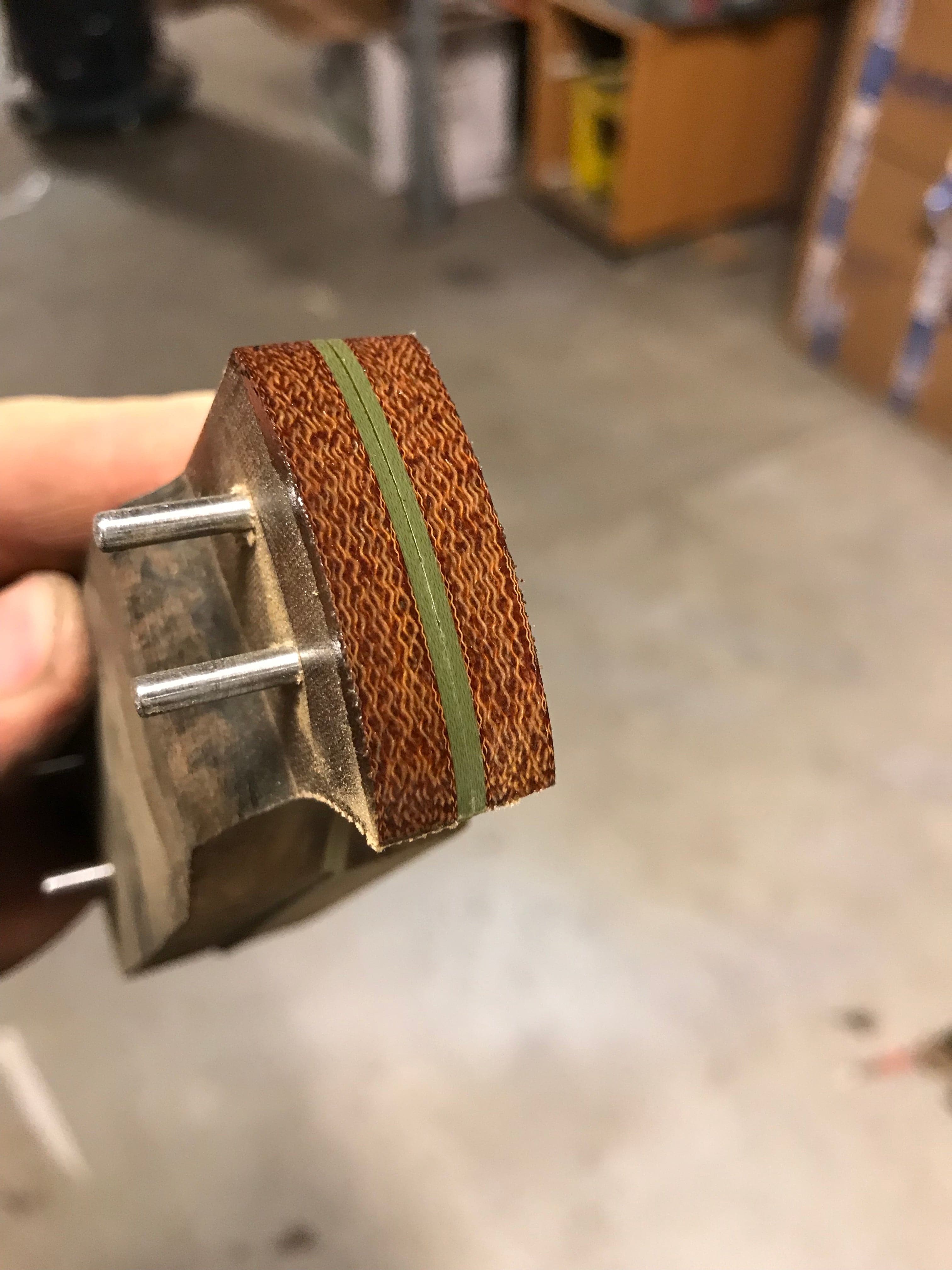 Micarta plate shaft material