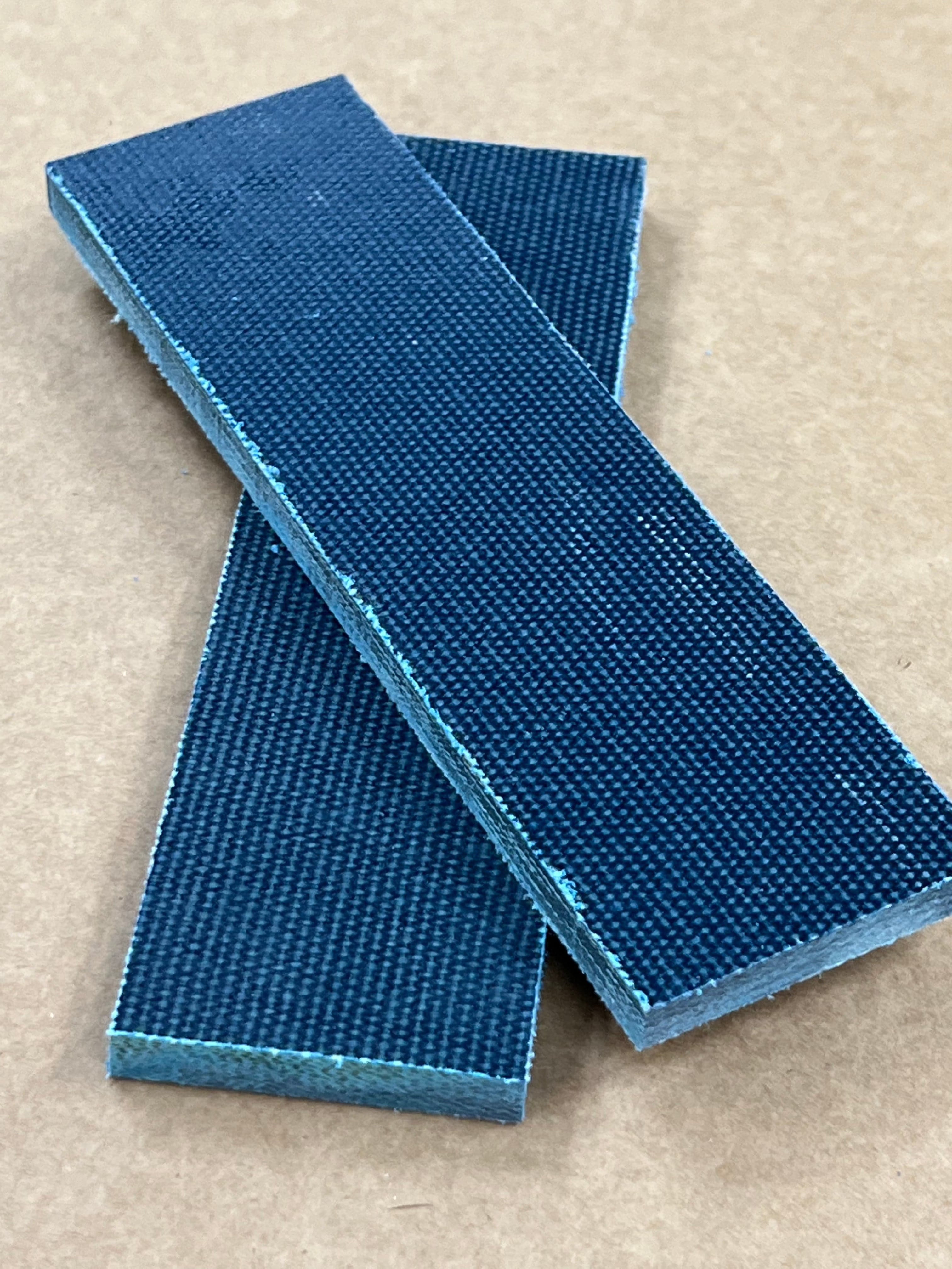 Micarta plate shaft material