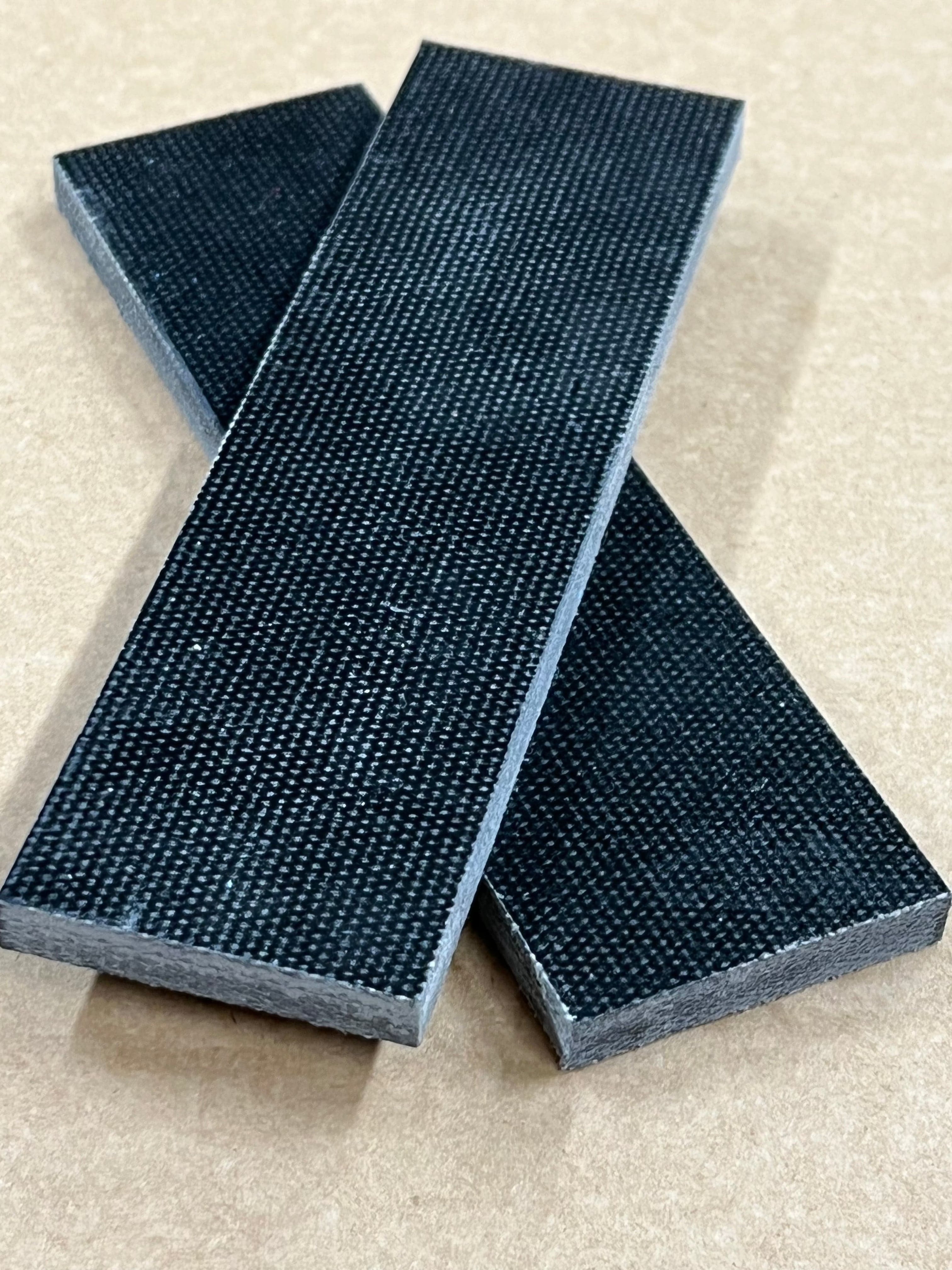 Micarta plate shaft material