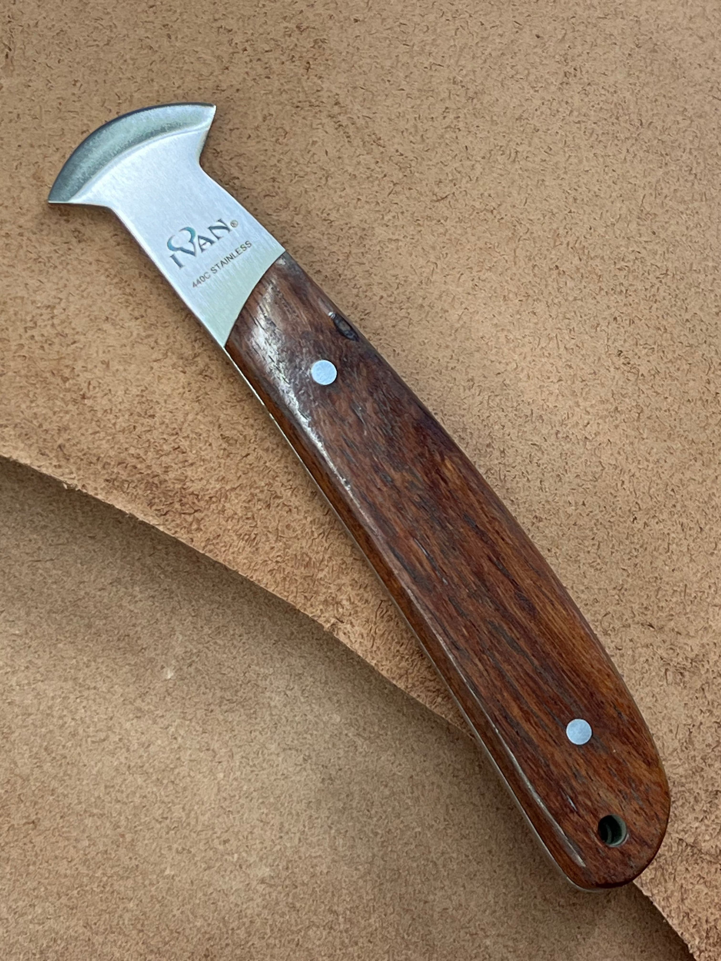 Rounded small French style leather knife