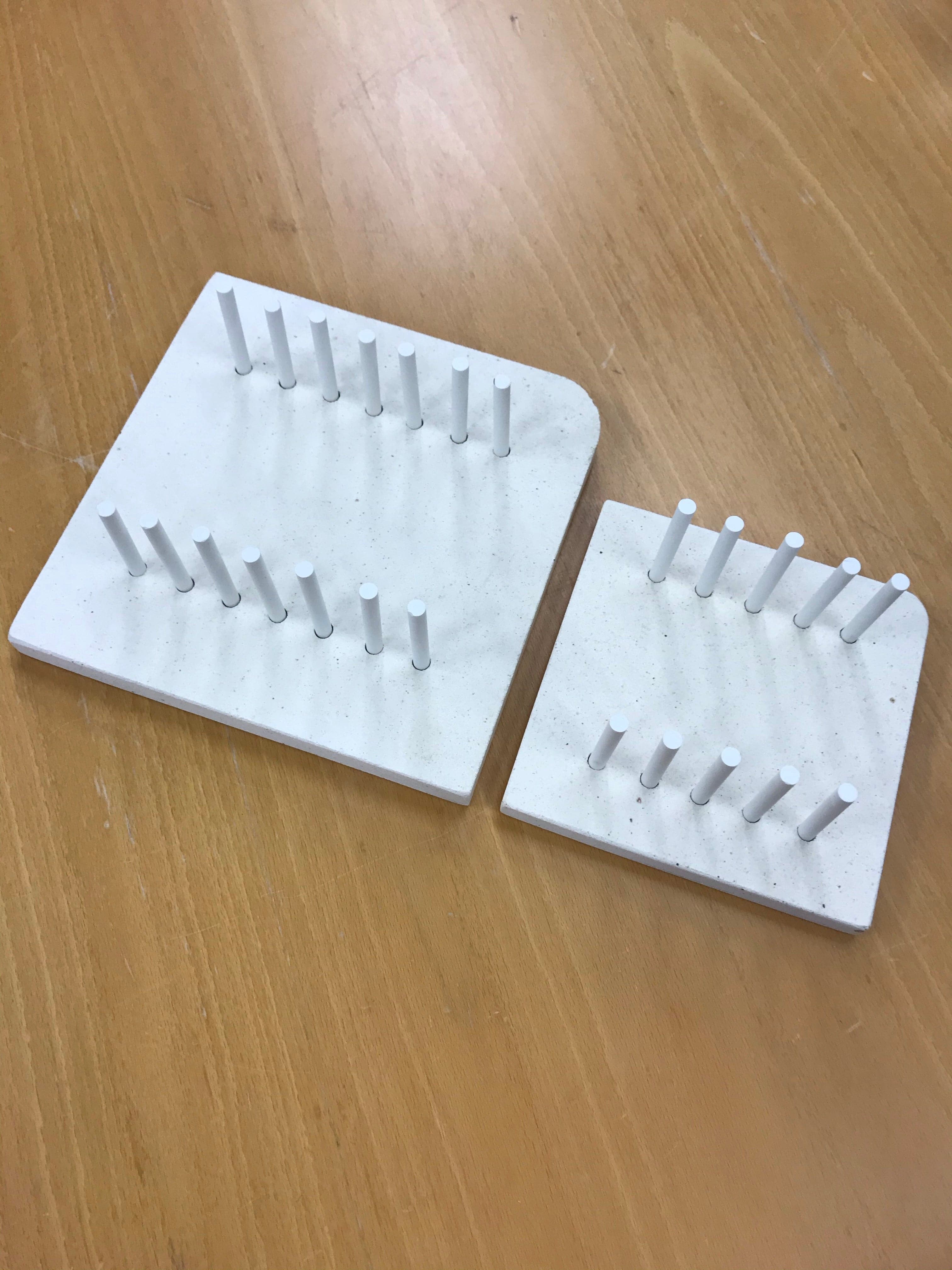 Knife blade holder for curing oven